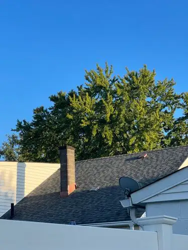 Sun-drenched rooftops under a brilliant blue sky.